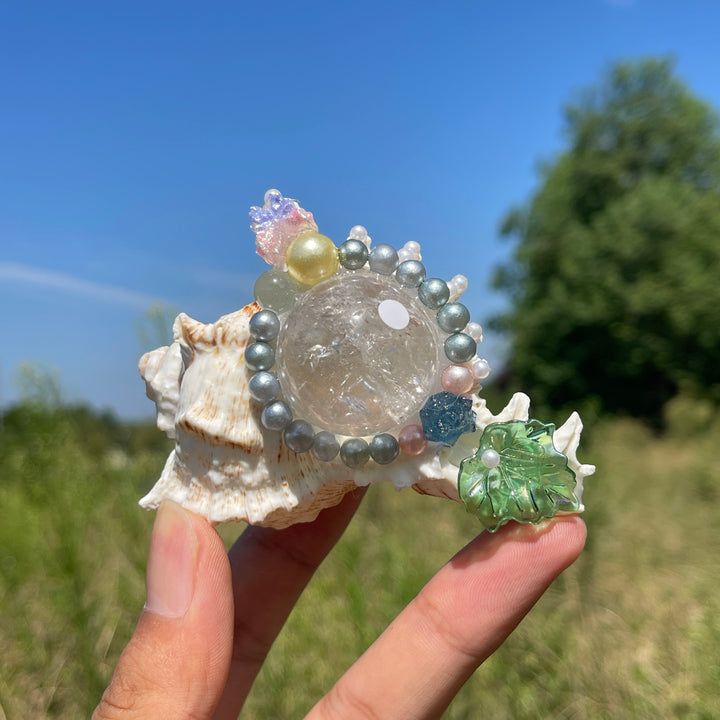 Unique,A Slightly Imperfect Natural Crystal Sphere With Conch