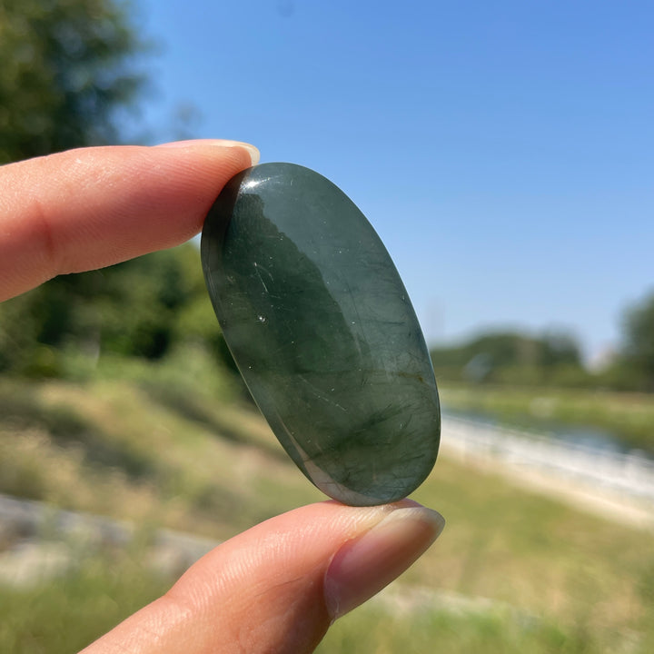 Natural Crystal Actinolite In Clear Quartz Palm Stone