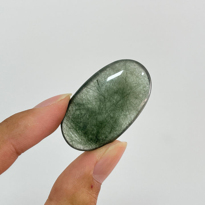 Natural Crystal Actinolite In Clear Quartz Palm Stone