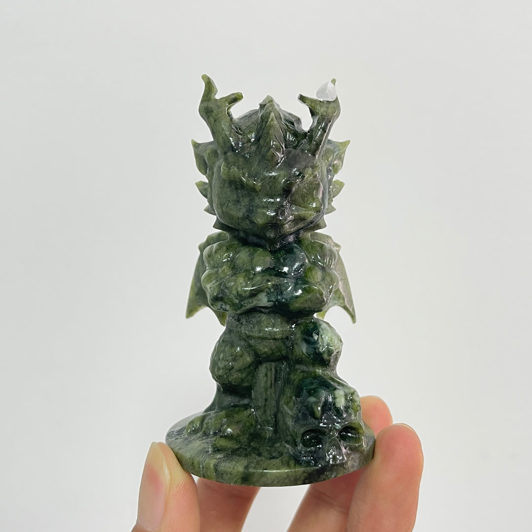 A Slightly Imperfect Natural Crystal Carving Serpentine Dragon With Skull