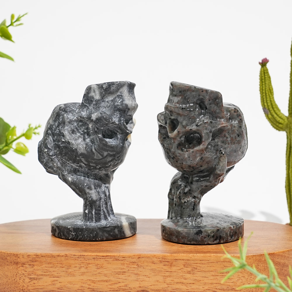 Natural Crystal Hand Holding Upside-Down Skull Carving