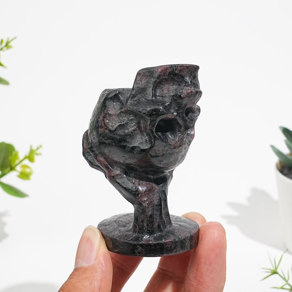 Natural Crystal Hand Holding Upside-Down Skull Carving