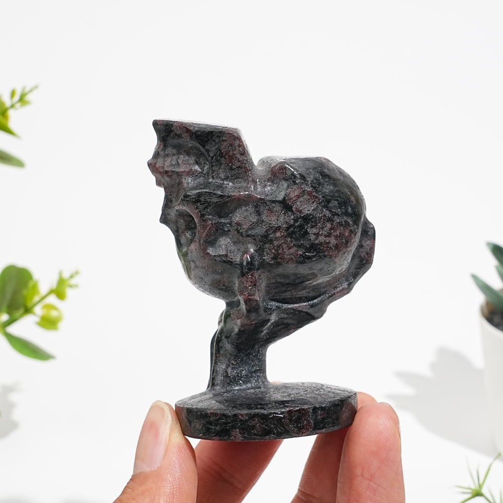 Natural Crystal Hand Holding Upside-Down Skull Carving