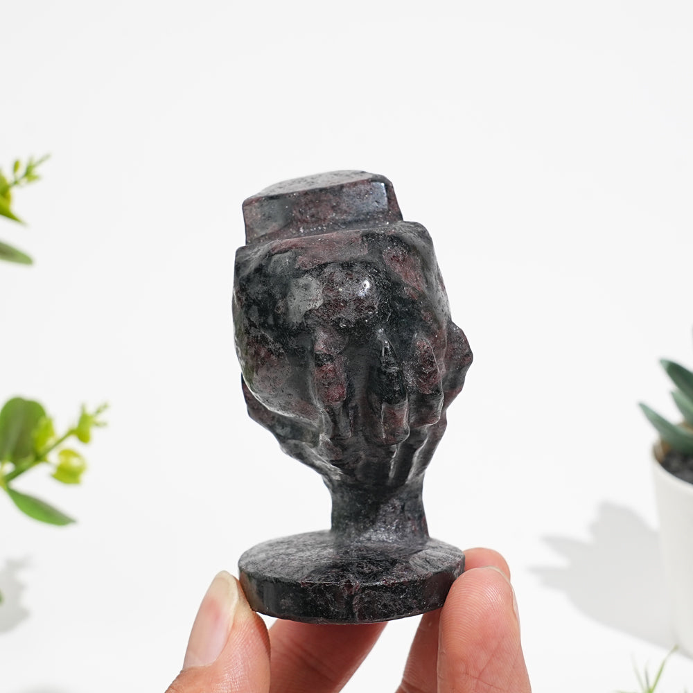 Natural Crystal Hand Holding Upside-Down Skull Carving