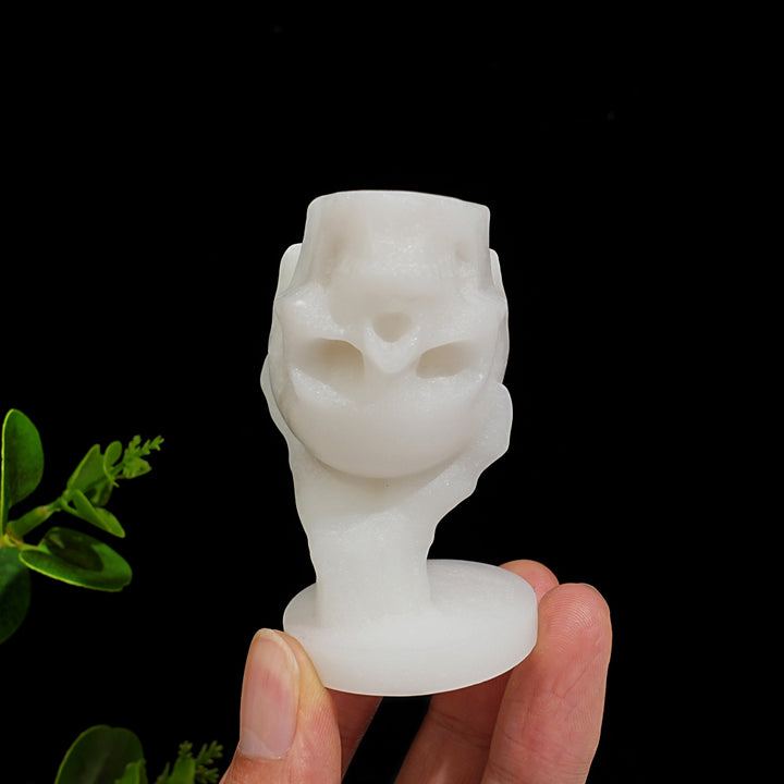 Natural Crystal Hand Holding Upside-Down Skull Carving