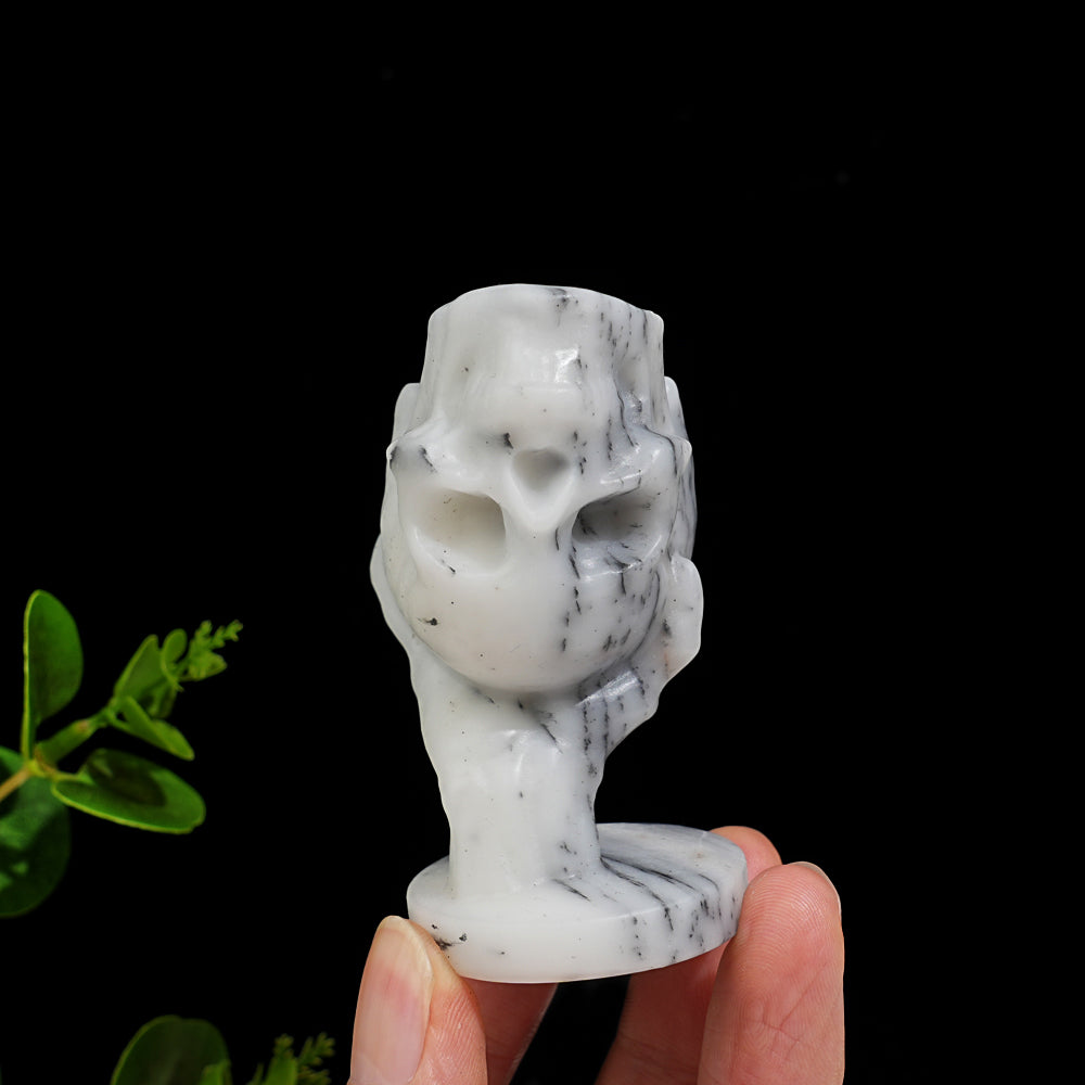 Natural Crystal Hand Holding Upside-Down Skull Carving