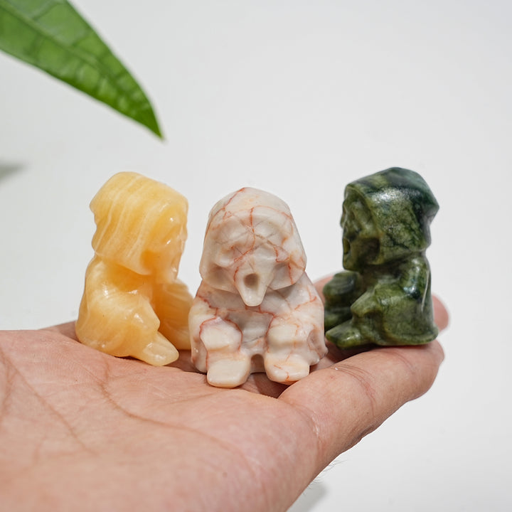 Natural Crystal Seated Grim Reaper Carving