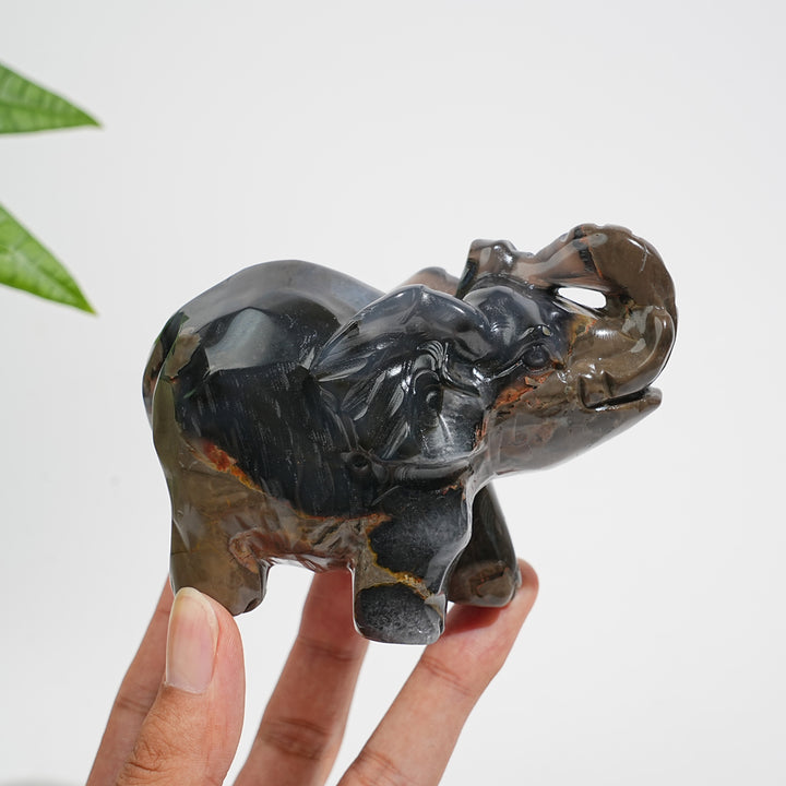 A Slightly Imperfect Natural Volcanic Agate Trunk-Up Elephant Carving