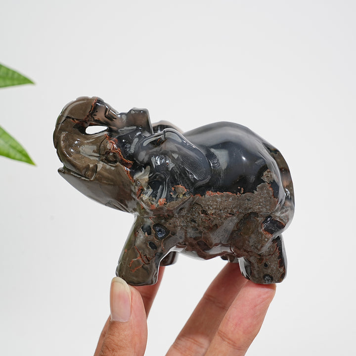 A Slightly Imperfect Natural Volcanic Agate Trunk-Up Elephant Carving