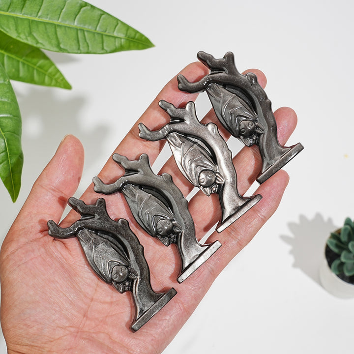 Natural Crystal Silver Obsidian Upside-Down Bat On Branch Carving