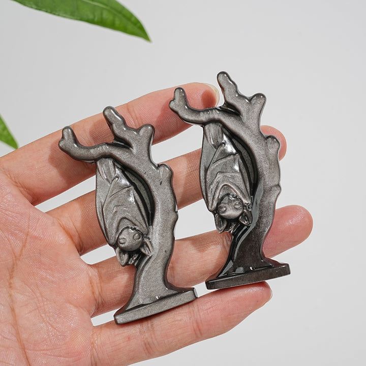 Natural Crystal Silver Obsidian Upside-Down Bat On Branch Carving