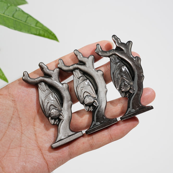 Natural Crystal Silver Obsidian Upside-Down Bat On Branch Carving