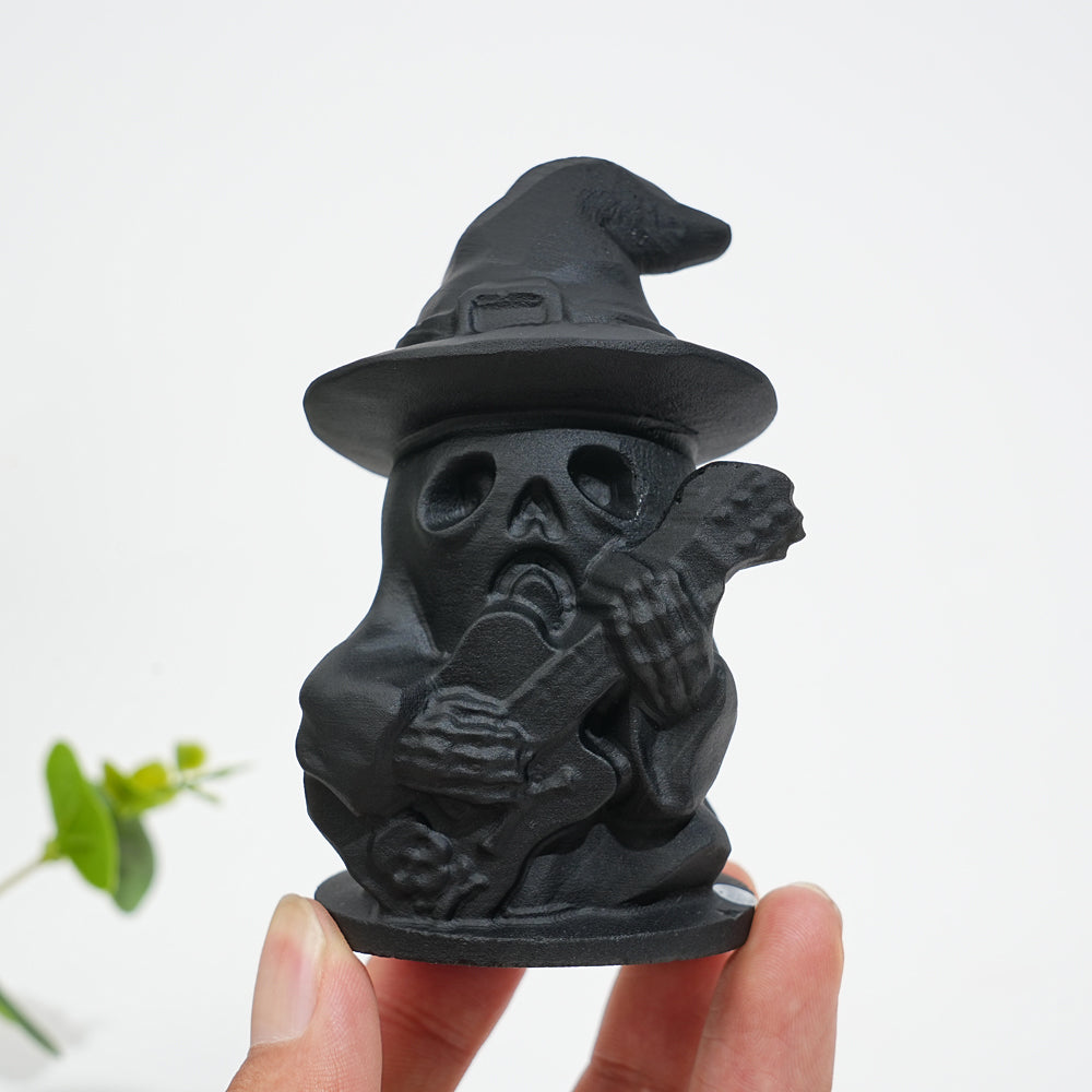 A Slightly Imperfect Natural Crystal Black Obsidian Guitar Playing Skull