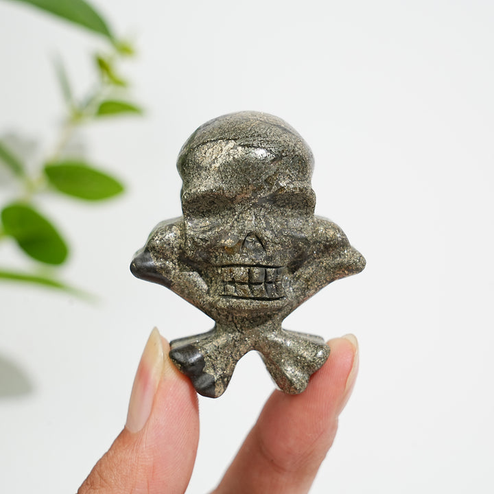 Natural Crystal Skull With Crossbone Carving