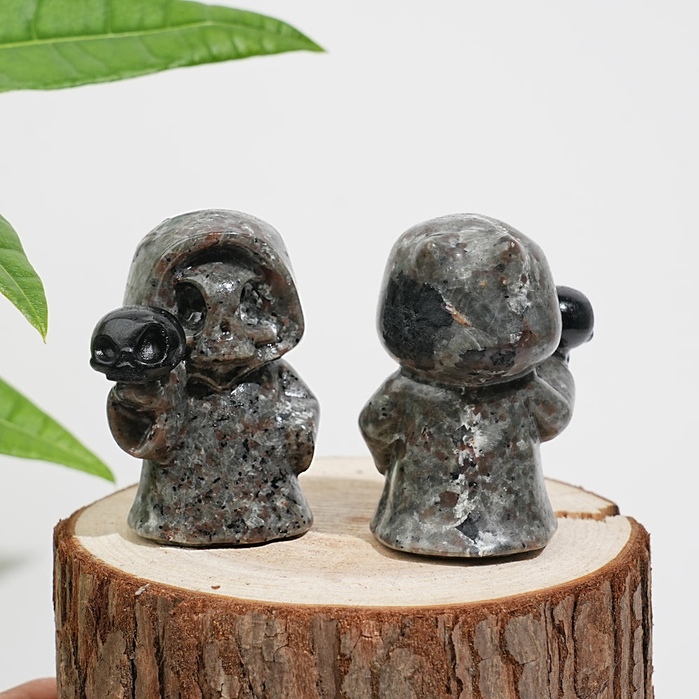 Natural Yooperlite Ghost Holding Skull Carving
