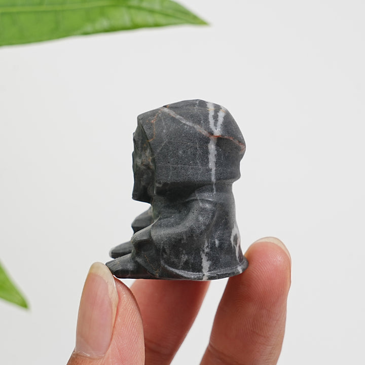 Natural Crystal Seated Grim Reaper Carving