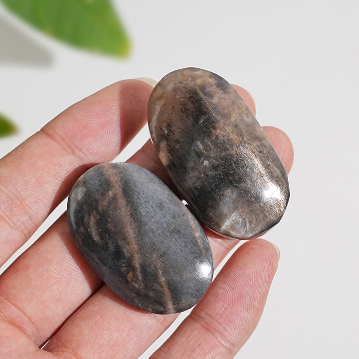 Natural Crystal Black Moonstone With Sunstone Palm Stone
