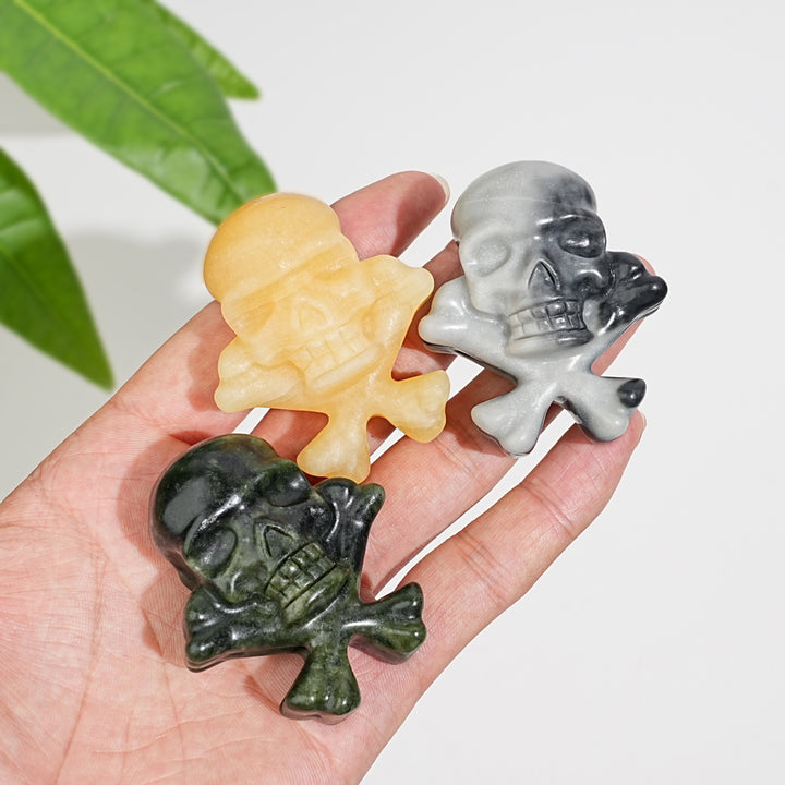 Natural Crystal Skull With Crossbone Carving