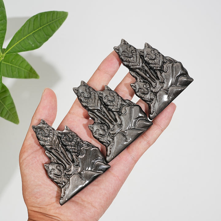 Natural Crystal Silver Obsidian Three‑Wolf Carving