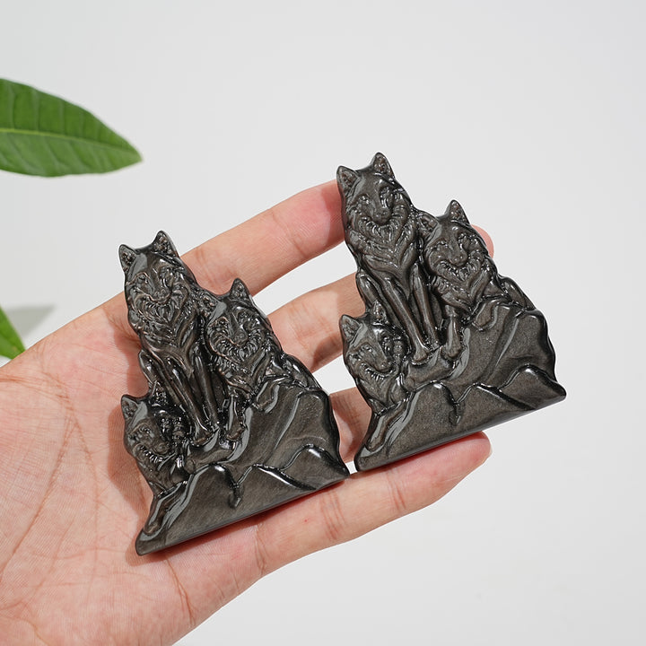 Natural Crystal Silver Obsidian Three‑Wolf Carving