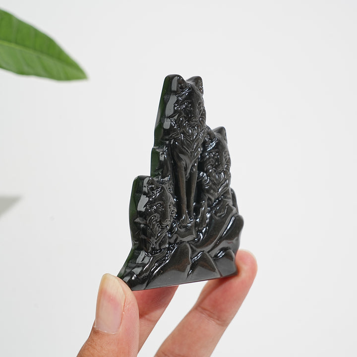 Natural Crystal Silver Obsidian Three‑Wolf Carving