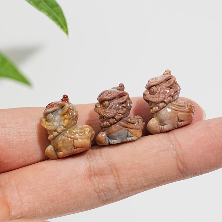 Natural Crystal Alashan Agate Lion Dance Mini Carving