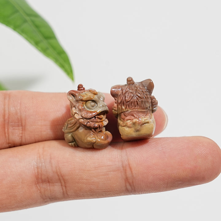 Natural Crystal Alashan Agate Lion Dance Mini Carving