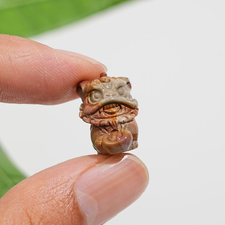 Natural Crystal Alashan Agate Lion Dance Mini Carving