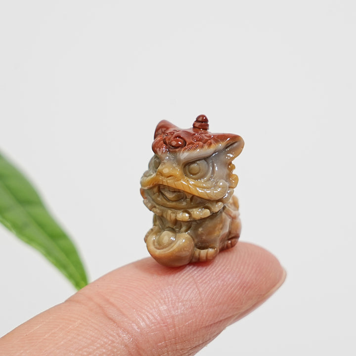 Natural Crystal Alashan Agate Lion Dance Mini Carving