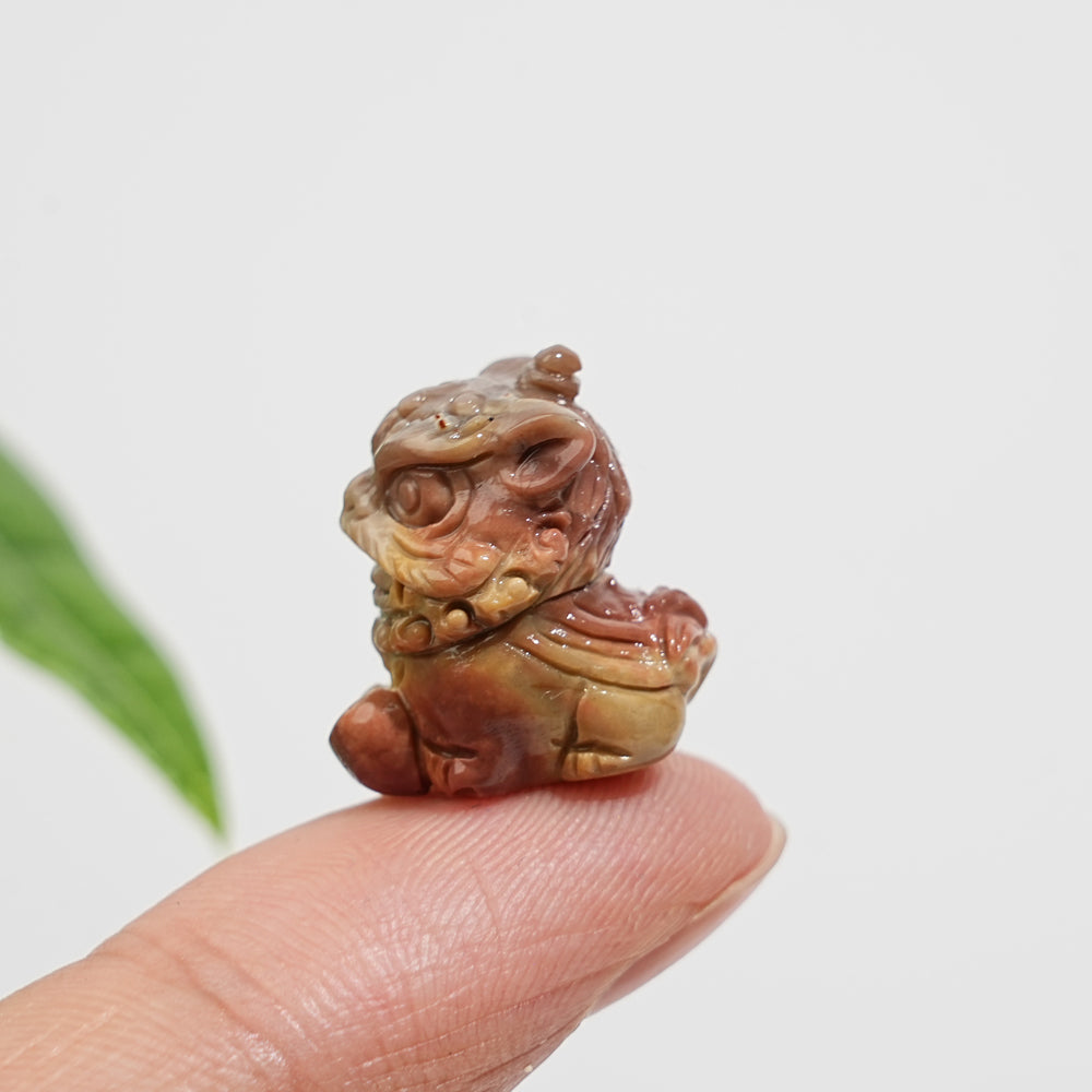 Natural Crystal Alashan Agate Lion Dance Mini Carving