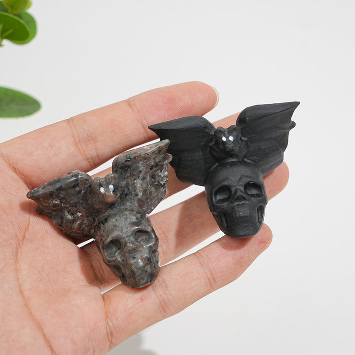 A Slightly Imperfect Natural Crystal Carving Skull With Cute Bat