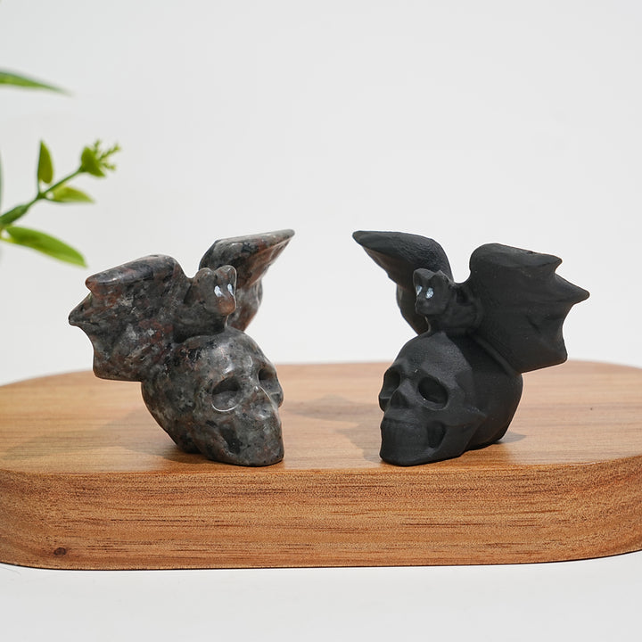 A Slightly Imperfect Natural Crystal Carving Skull With Cute Bat