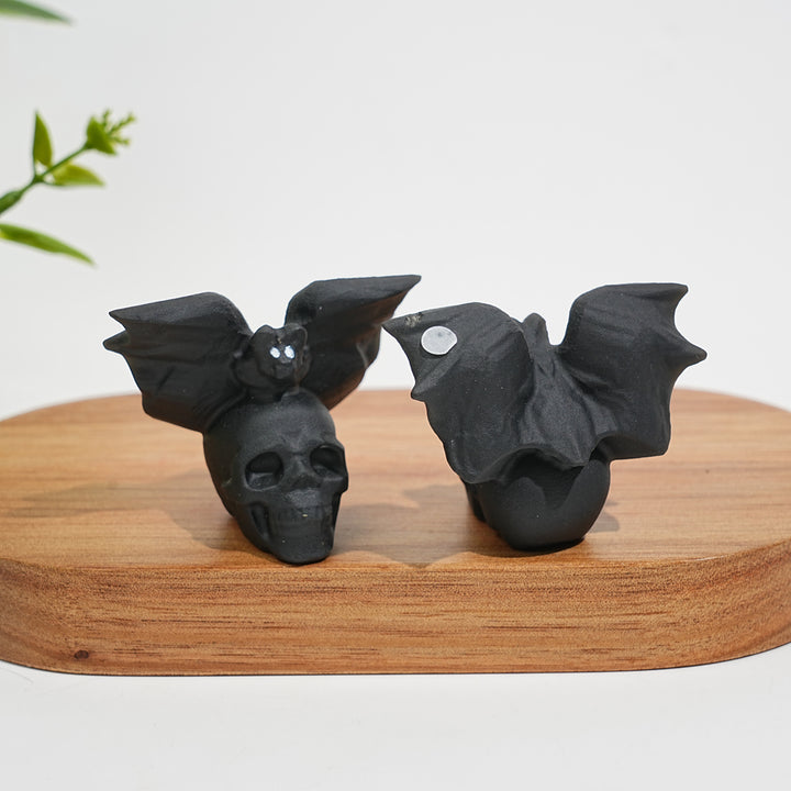 A Slightly Imperfect Natural Crystal Carving Skull With Cute Bat