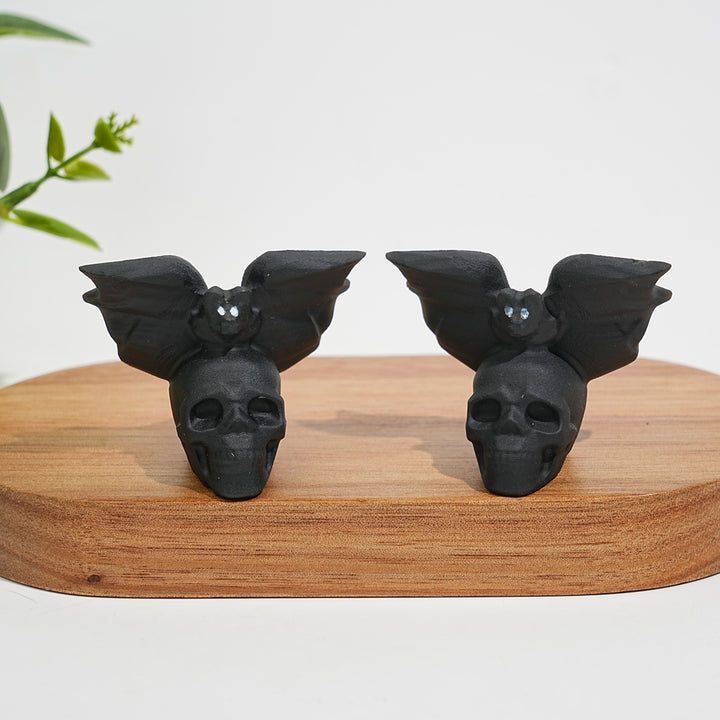 A Slightly Imperfect Natural Crystal Carving Skull With Cute Bat