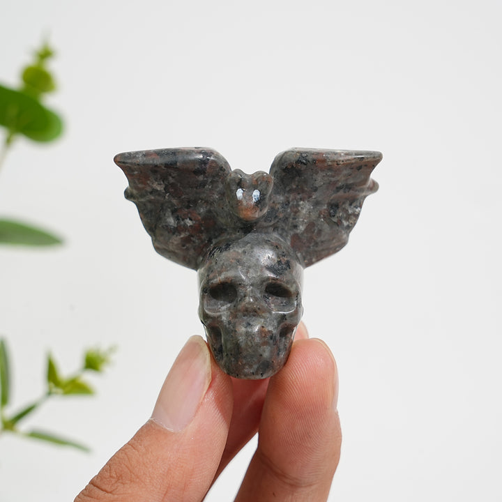 A Slightly Imperfect Natural Crystal Carving Skull With Cute Bat