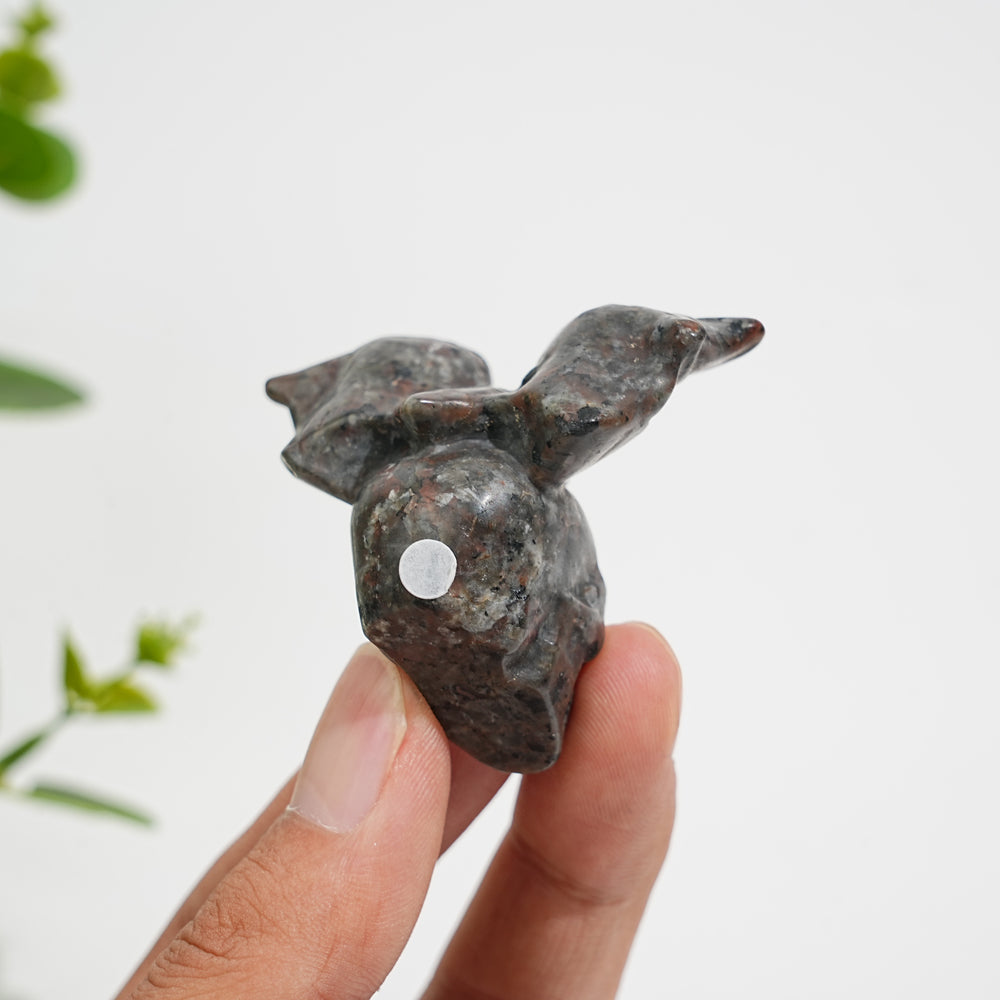 A Slightly Imperfect Natural Crystal Carving Skull With Cute Bat