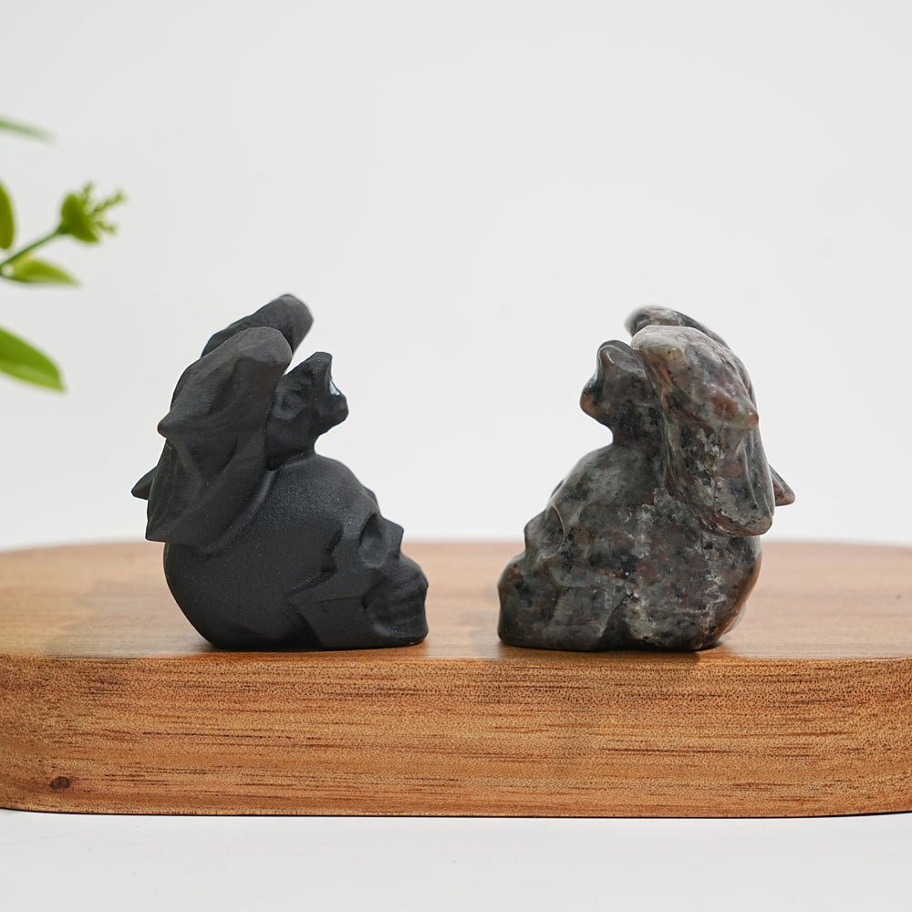 A Slightly Imperfect Natural Crystal Carving Skull With Cute Bat