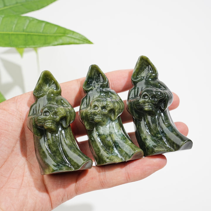 Natural Crystal Serpentine Ghost Reaper Holding Skull Carving
