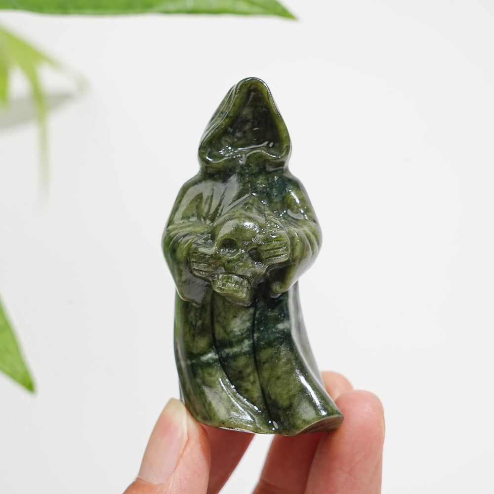 Natural Crystal Serpentine Ghost Reaper Holding Skull Carving