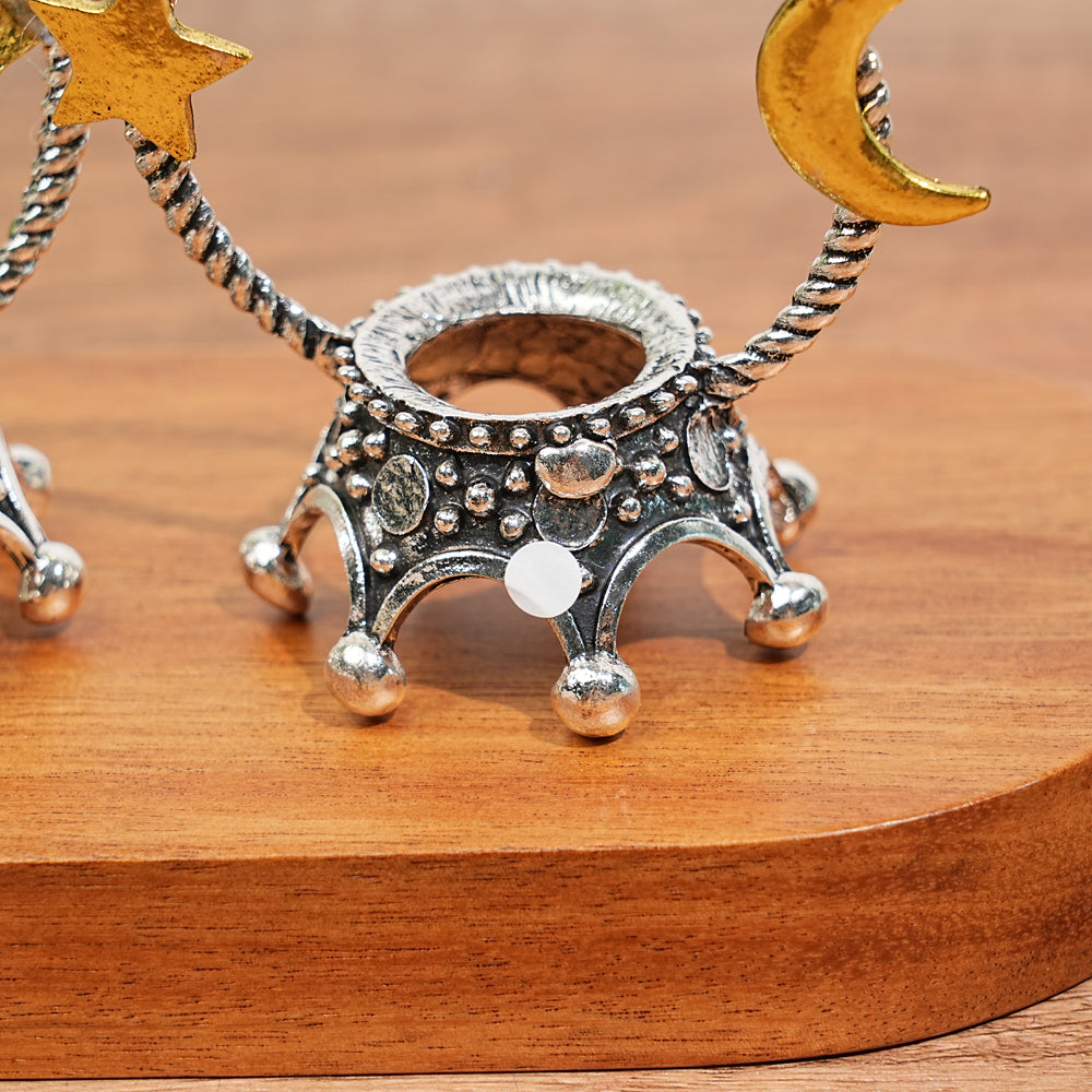 A Slightly Imperfect Metal Star With Moon Sphere Stand