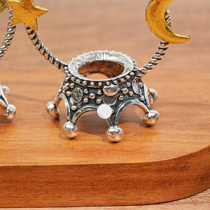 A Slightly Imperfect Metal Star With Moon Sphere Stand