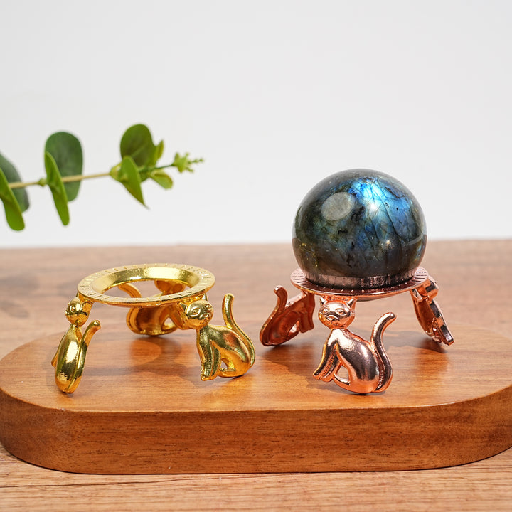 A Slightly Imperfect Metal Cat Shape Crystal Sphere Stand