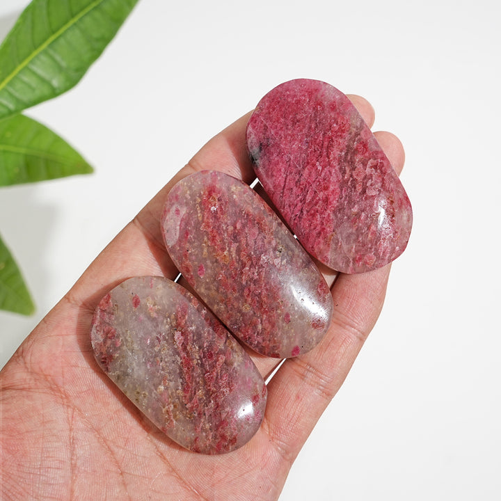 Natural Crystal Rhodonite In Quartz Palmstone