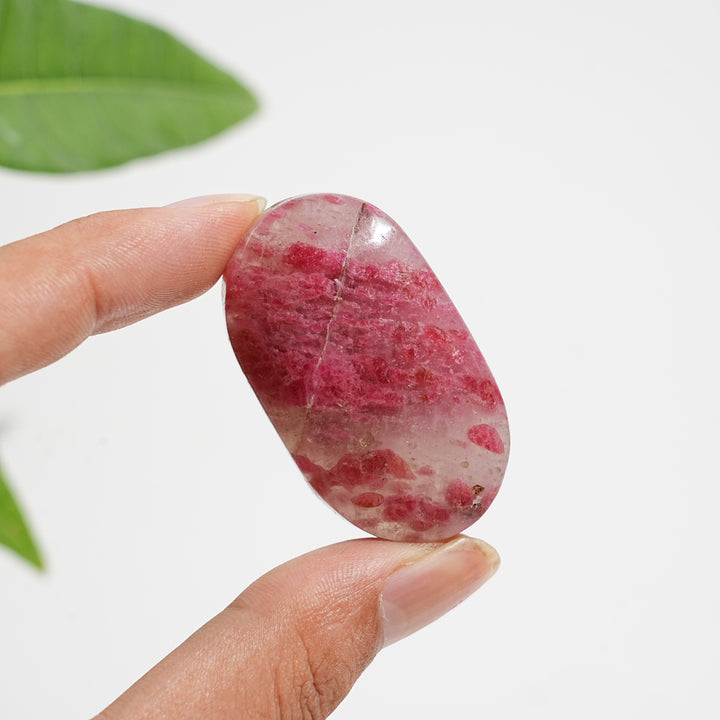 Natural Crystal Rhodonite In Quartz Palmstone