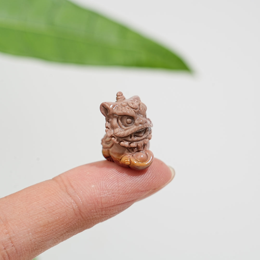 Natural Crystal Alashan Agate Lion Dance Mini Carving