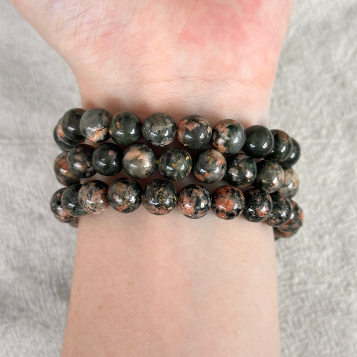 Actinolite in Quartz with Orange Calcite Bracelet 8.5-8.9mm