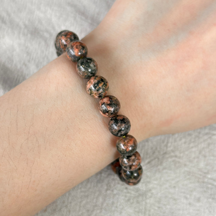 Actinolite in Quartz with Orange Calcite Bracelet 8.5-8.9mm