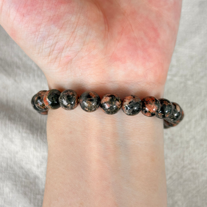 Actinolite in Quartz with Orange Calcite Bracelet 8.5-8.9mm