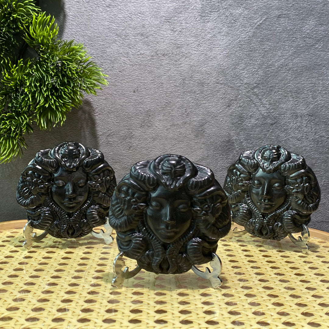Sonne und Mond aus goldenem/silbernem Obsidian
