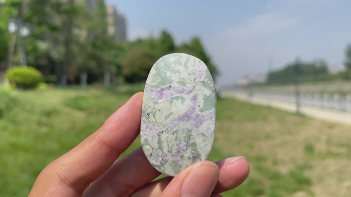 Natural Light Atlantisite Crystal Palm Stone